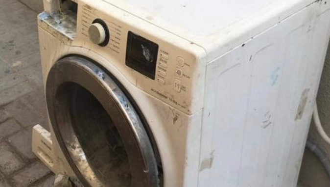 máy giặt công nghiệp cũ